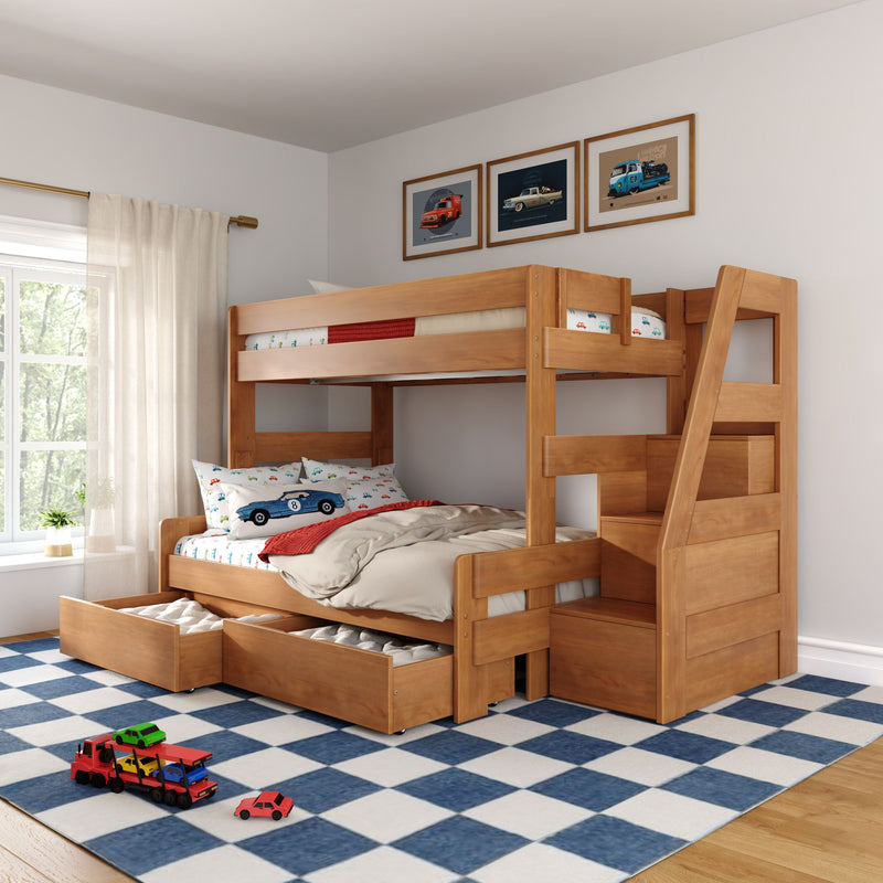 Wooden kids bunk bed with built-in storage drawers and staircase, car-themed bedding and framed vintage car prints in a bright children's bedroom
