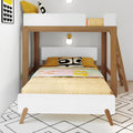 Modern wooden bunk bed with white guardrails, yellow bedding and patterned pillows in a Scandinavian kids' bedroom with ladder and wall sconce