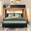 Modern wooden loft bunk bed with mint-green bedding, navy striped pillows, yellow bolster, ladder and textured rug in a styled kids' bedroom