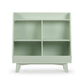 Mint green wooden shelving unit with four cubby compartments and angled legs, modern mid-century kids storage bookcase