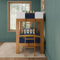 Wooden loft bunk bed with ladder, navy bedding and striped pillows against green textured wallpaper, large window with forest view in a modern kids’ bedroom