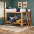 Wooden kids' bunk bed with ladder, navy bedding, green striped pillows and mustard throw on textured wallpaper