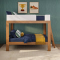 Wooden kids bunk bed with navy bedding, green striped pillows, mustard throw, teal wallpaper and framed trophy and sneaker prints