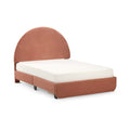 Terracotta pink upholstered twin bed with rounded headboard and white mattress on a modern fabric platform frame