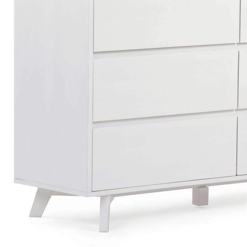 Close-up of modern white wooden dresser chest of drawers with flat drawer fronts and angled mid-century tapered legs on a white background, minimalist bedroom furniture