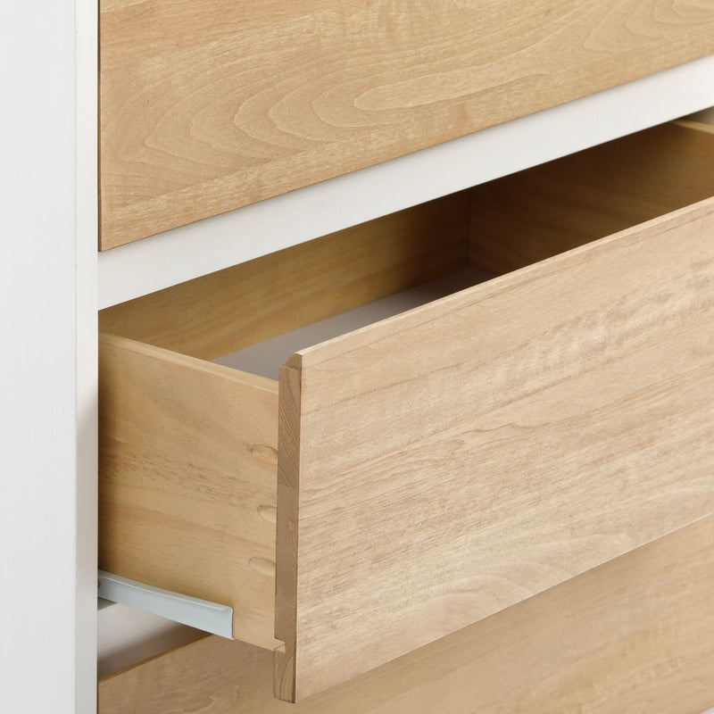 Close-up of a light natural wood dresser drawer with visible dovetail joinery, white frame and white metal drawer slide, modern minimalist bedroom storage