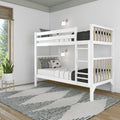 White wooden bunk bed with ladder in modern Scandinavian kids' bedroom, striped rug, potted plant, wall sconces and sunlit window