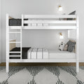 White wooden twin-over-twin bunk bed with ladder, black-and-white bedding, throw pillows and wall lamps in a modern kids' bedroom