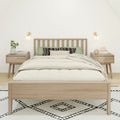 Minimalist bedroom with light wood bed frame, neutral linen bedding, green accent pillows, wooden nightstands and wall sconces on patterned rug
