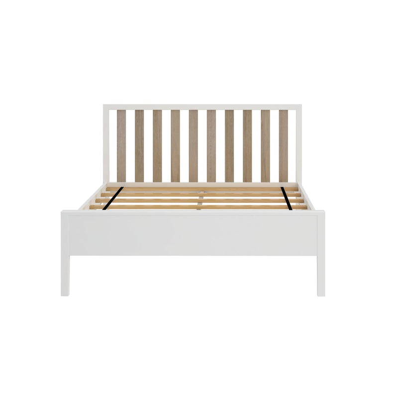 Modern white wooden platform bed frame with vertical natural wood slatted headboard and wooden slat mattress support