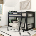Black wooden bunk bed with ladder in modern kids' bedroom, green throw pillows and beige bedding, world map wall art, white geometric rug and natural window light