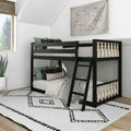 Modern black wooden bunk bed in a bright kids' bedroom with neutral bedding, green accent pillows, world map wall art and black-and-white geometric rug