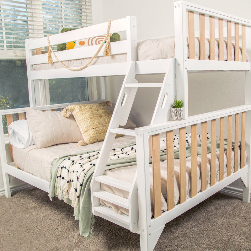 Modern white wooden bunk bed with natural wood slats and ladder in bright neutral kids' bedroom, cozy beige bedding, textured throw and decorative pillows