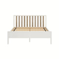 White wooden platform bed frame with natural oak slatted headboard and wooden slat support base on white background