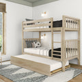 Light oak wooden bunk bed with pull-out trundle, striped bedding, pillows and wall sconces in a bright modern kids' bedroom