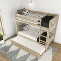 Light wood triple bunk bed with trundle and ladder in modern minimalist kids' bedroom with black-and-white bedding and accent pillows