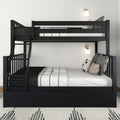 Modern black wooden twin-over-full bunk bed with ladder and under-drawer storage, white grid bedding and decorative pillows in a minimalist kids' bedroom with wall sconces