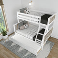 White wooden bunk bed with pull-out trundle and ladder in modern Scandinavian kids' bedroom with black-and-white geometric bedding, decorative pillows, wall sconce, potted plant and natural window light