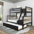 Black wooden bunk bed with pull-out trundle and ladder in modern kids' bedroom with wall sconces