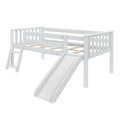 White wooden kids loft bed with slide and ladder, safety guardrails and slatted mattress platform