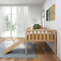 Modern Scandinavian kids bedroom featuring a wooden toddler bed with slide, mustard cushions and leaf pillow, framed animal nursery wall art, and a large window with sheer curtains letting in natural light