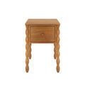 Oak-finish wooden nightstand with single drawer and turned spindle legs, compact bedside table for bedroom or living room storage