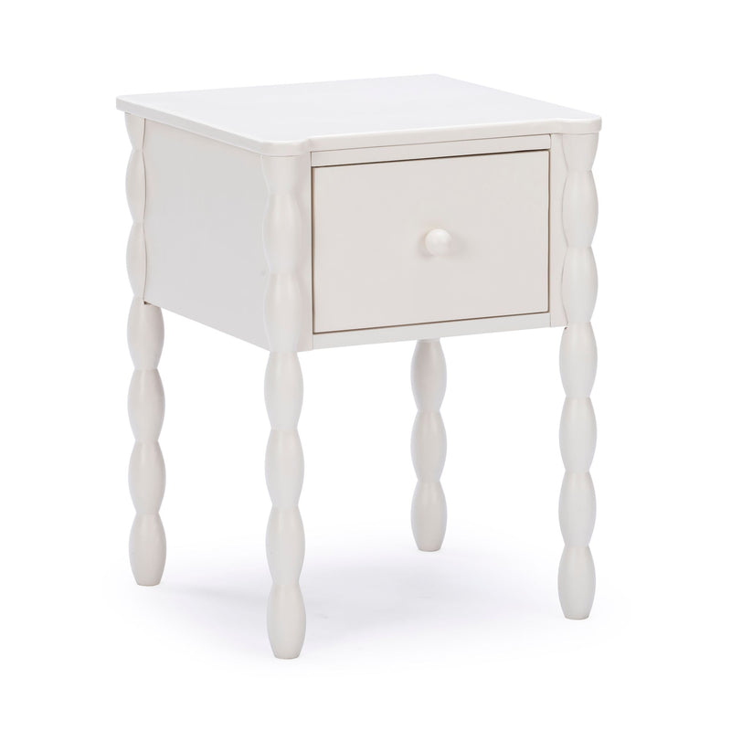 White wooden nightstand with single drawer and turned spindle legs, cottage farmhouse bedside table