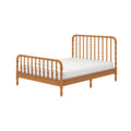 Natural solid wood spindle bed frame with turned spindles headboard and footboard and white mattress — farmhouse platform bed