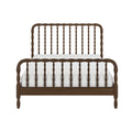 Wooden spindle bed frame with turned spindles, curved headboard and footboard in dark walnut finish with white mattress, farmhouse vintage-style bed