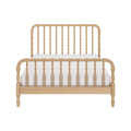 Scandinavian-style light natural wood bed frame with turned spindle headboard and footboard and white mattress