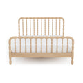 Natural light wood spindle bed frame with rounded beaded headboard and footboard and white mattress, modern rustic design