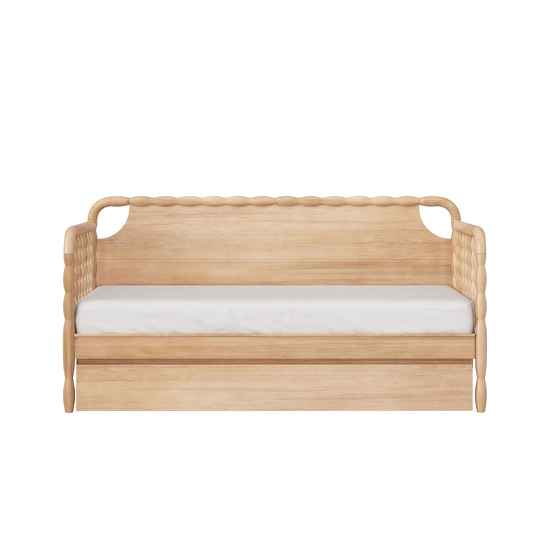 Natural oak wooden daybed with carved scalloped headboard and turned rope-style arms, minimalist Scandinavian twin bed with white mattress