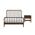 Dark walnut spindle wooden bed frame with white bedding and matching solid wood nightstand, farmhouse style