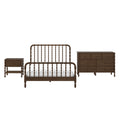 Dark walnut spindle bed with white bedding, matching wooden dresser and nightstand — solid wood farmhouse bedroom set