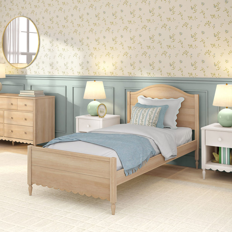 Cozy coastal farmhouse bedroom interior with light wood twin bed, floral wallpaper, pastel blue wainscoting, bedside lamps, white nightstand and wooden dresser — bedroom decor inspiration