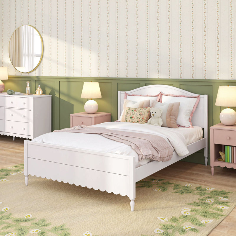 Cozy girl's bedroom with white bed, pink nightstands, floral pillows and teddy bear against green wainscoting and striped floral wallpaper