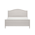 Light gray painted wooden bed frame with curved arched headboard, scalloped footboard and turned legs — farmhouse shabby‑chic bedroom furniture