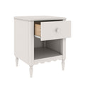 White wooden nightstand bedside table with one drawer, open lower shelf, round knob and turned legs, scalloped apron – modern farmhouse bedroom furniture