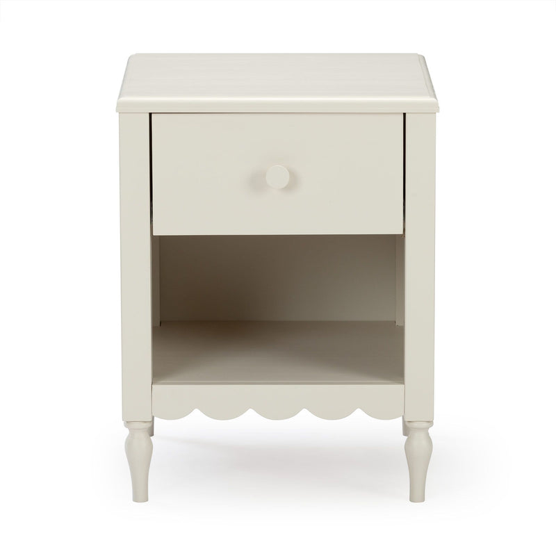 White painted wooden bedside nightstand with one drawer and open shelf, scalloped apron and turned legs, farmhouse style
