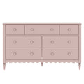 Blush pink wooden dresser with round knobs, scalloped apron and turned legs, vintage-style chest of drawers for nursery or bedroom