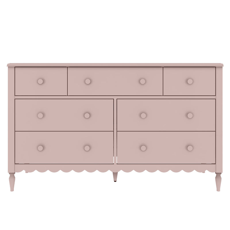Blush pink wooden dresser with round knobs, scalloped apron and turned legs, vintage-style chest of drawers for nursery or bedroom