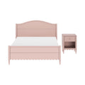 Pink wooden bed frame with curved headboard and matching pink nightstand on white background — cottage-style children's bedroom furniture