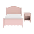 Pastel pink wooden twin bed with arched headboard, scalloped footboard and matching pink nightstand — children's bedroom furniture