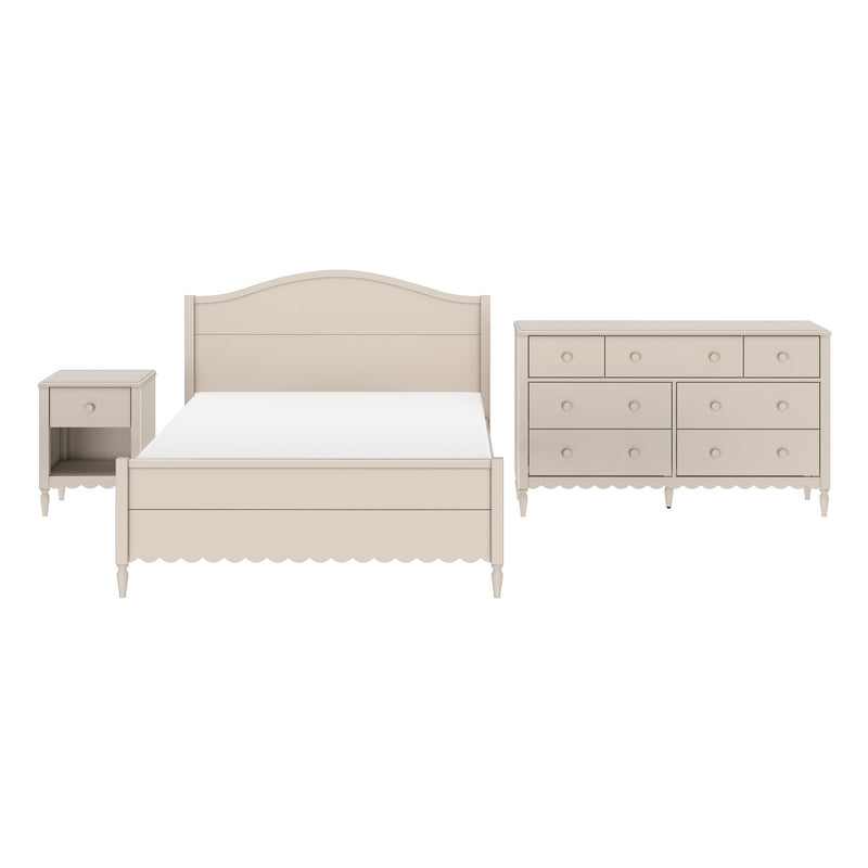 Beige farmhouse-style wooden bedroom furniture set with arched headboard bed, matching nightstand, and six-drawer dresser on white background