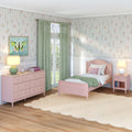Pastel pink girls bedroom with twin bed, floral wallpaper, green curtains, pink dresser and nightstand, bedside lamps and butterfly wall art