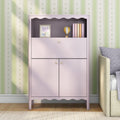 Pink nursery cabinet with scalloped shelf holding framed tulip print, wooden hot-air-balloon toy and pastel books against green star-striped wallpaper — children's room storage and decor