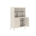 Beige wooden secretary cabinet with drop-down desk, storage cubbies, open lower doors, scalloped trim and built-in power outlet