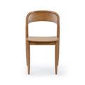 Mid-century modern solid oak dining chair with curved backrest, contoured seat and tapered legs on white background