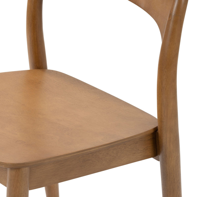 Close-up of light solid wood dining chair seat and curved backrest showing natural wood grain and mid-century modern design