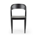 Black wooden dining chair with curved arched backrest and tapered legs, modern minimalist design on white background